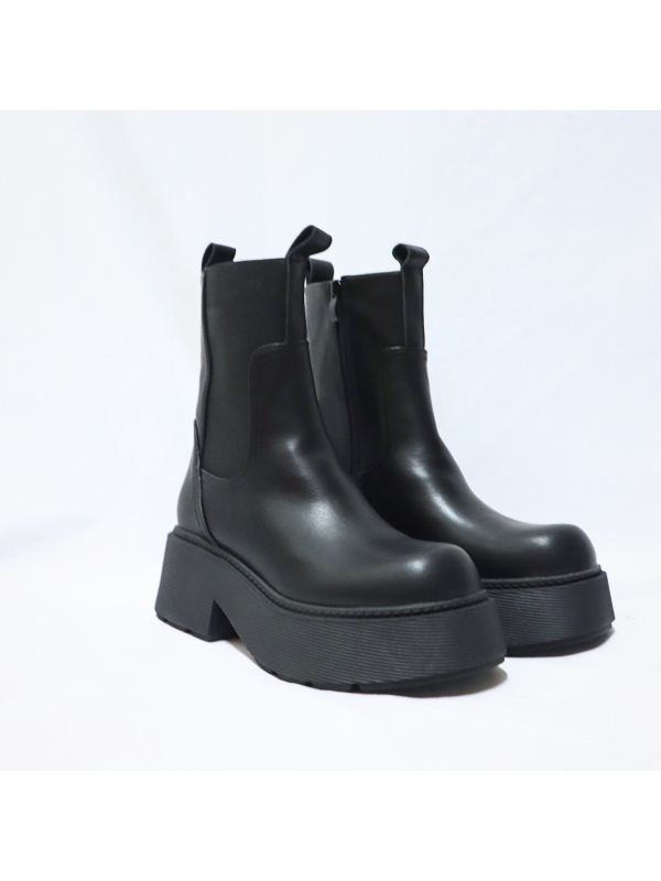 Botín gruesa a la moda con cremallera...