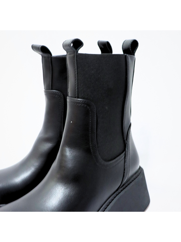 Botín gruesa a la moda con cremallera...