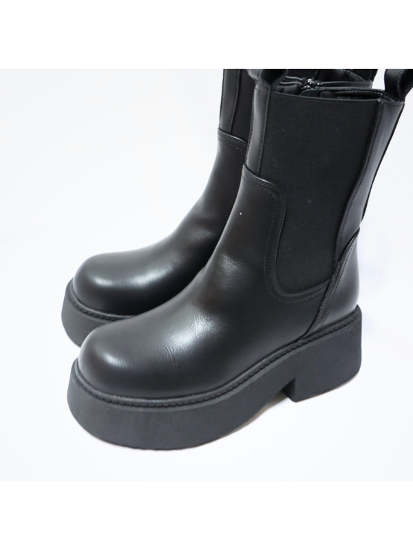 Botín gruesa a la moda con cremallera...