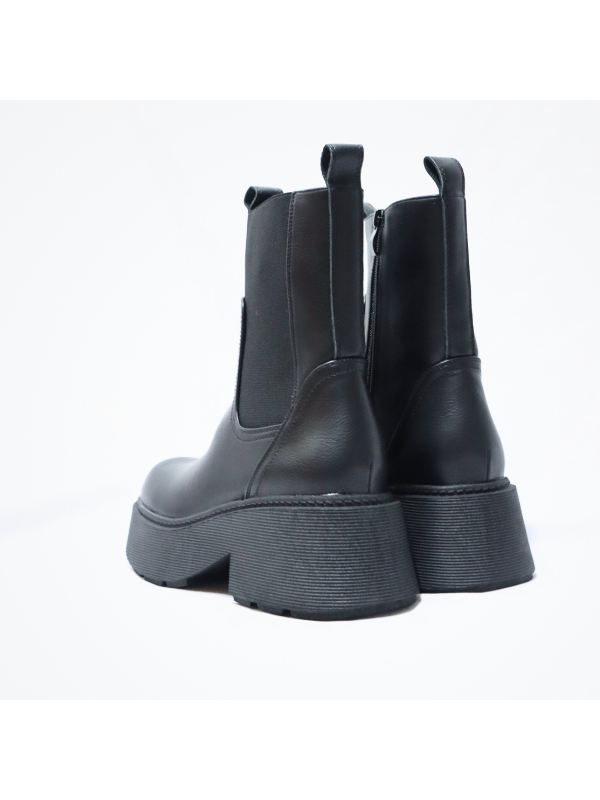 Botín gruesa a la moda con cremallera...