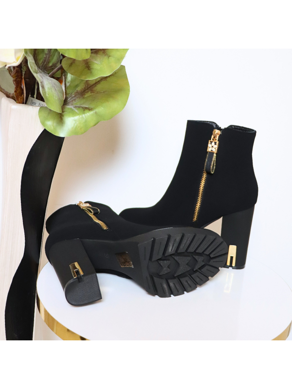 Elegantes botines de tacón alto con...