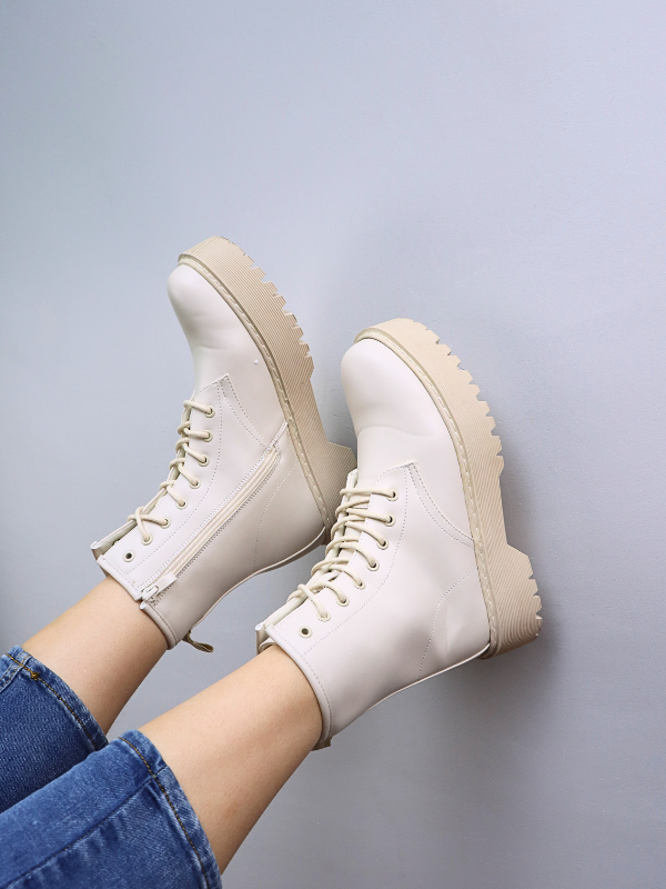 Botines beige con cordón y cremallera...