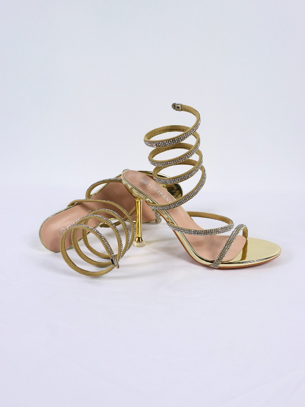 Sandalias tiras espiral con tacón aguja.